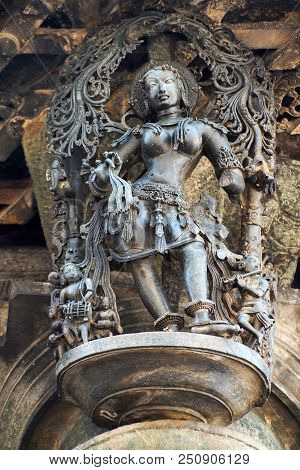 Shilabalika, Celestial Maiden, In A Beauty Dance Pose. A Lady Practicing Dance Steps. Her Maids Are 