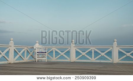One Chair On Sea Coast, Concept Of Resort