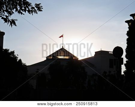 Sun Sunset Over Polish Senate And Parliament Building, Warsaw, Poland