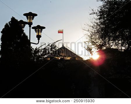 Sun Sunset Over Polish Senate And Parliament Building, Warsaw, Poland
