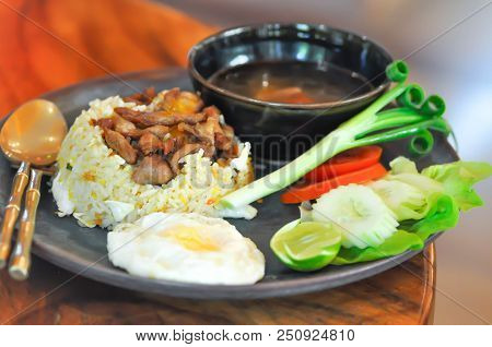 Stir-fried Rice With Fried Pork Topping And Vegetable