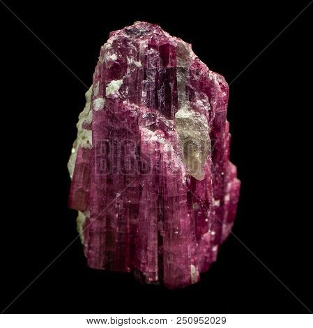 Natural Mineral Elbaite Tourmaline Natural Cut On A Black Background