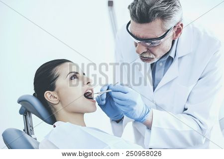 Young Patient With Doctor. White Famale Patient. Appointment Of Dantist. Healthcare Concept. Medicin