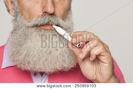Old Smoker Smoking Hybrid Smokeless Cigarette Device That Uses Real Tobacco Refills, A Hybrid Techno