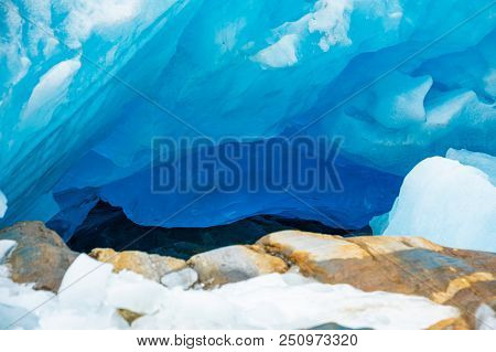Blue Ice Cave Of Svartisen Glacier In Norway