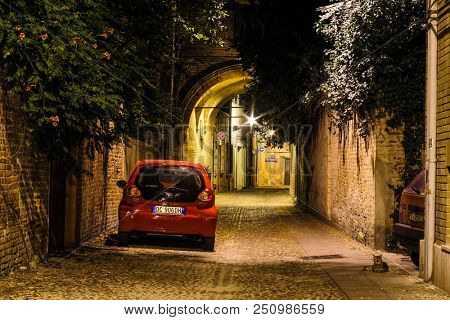 Ferrara, Italy - July, 23, 2018: cars parked in Ferrara, Italy, at night