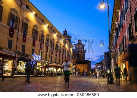 Ferrara, Italy - July, 23, 2018: street in the historical center of Ferrara at a night