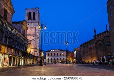 Ferrara, Italy - July, 23, 2018: street in the historical center of Ferrara at a night