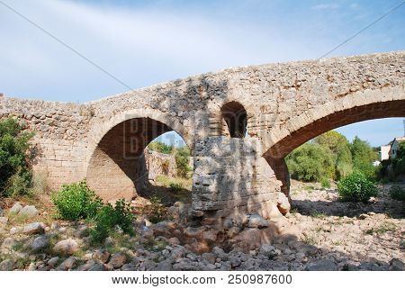 The Roman bridge across the Torrent de Sant Jordi at Pollenca on the Spanish island of Majorca.