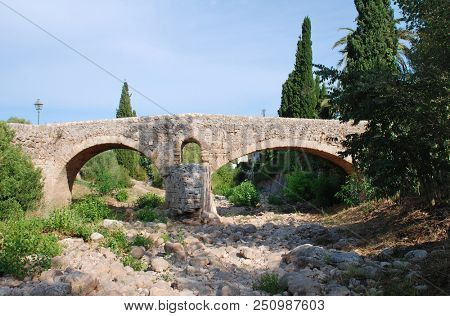 The Roman bridge across the Torrent de Sant Jordi at Pollenca on the Spanish island of Majorca.