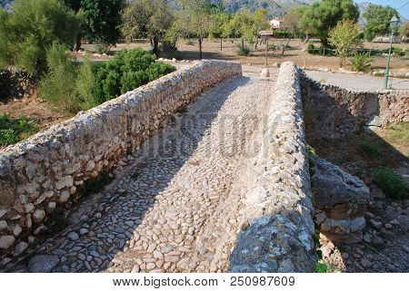 The Roman bridge across the Torrent de Sant Jordi at Pollenca on the Spanish island of Majorca.