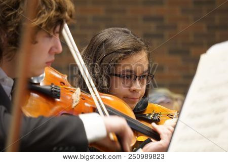 Romeoville, Illinois / United States - March 15, 2017: Violinists Of The Metropolitan Youth Symphony