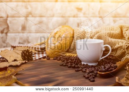 Cup Of Hot Coffee With Toast For Autumn Season Warm Drink. Fall Harvest Cornucopia. Copy Space On Wo
