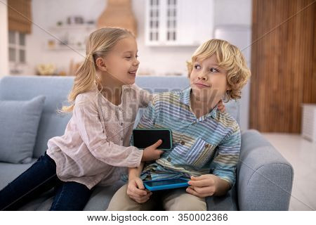 Girl Trying To Embrase Boy, Boy Feeling Surprised