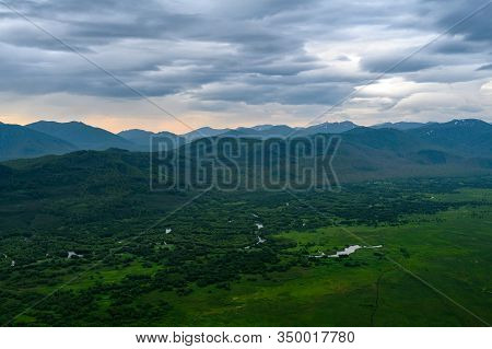 Panoramic View Of The City Petropavlovsk-kamchatsky And Volcanoes: Koryaksky Volcano, Avacha Volcano