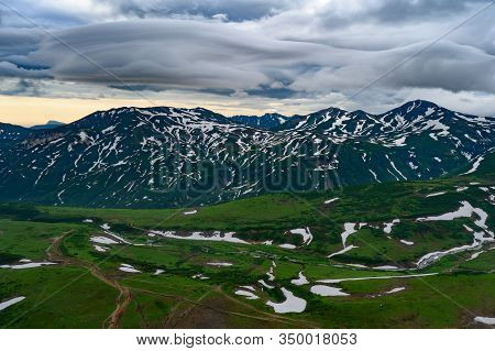 Panoramic View Of The City Petropavlovsk-kamchatsky And Volcanoes: Koryaksky Volcano, Avacha Volcano