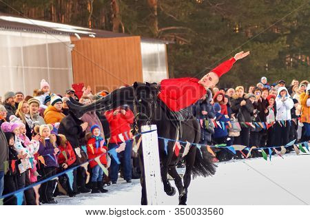 Russia, Moscow Region, Drakino Park- February 21, 2015: Traditional Slavic Holiday Seeing Off Winter