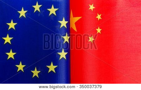 Fragments Of European Union And Chinese Flags In Close-up