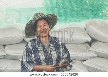 Smart Farmer Agriculturist With Organic Fertilizer