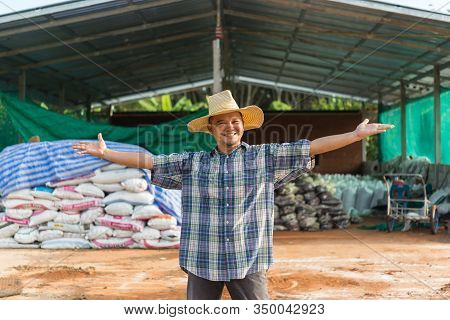 Farmer Agriculturist With Organic Fertilizer