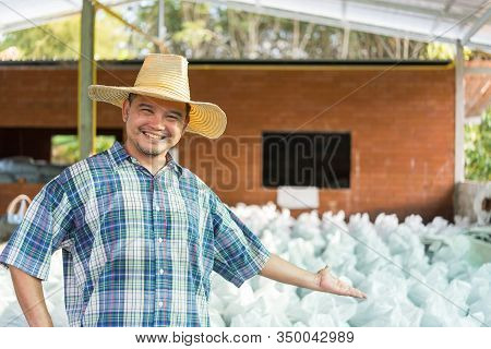 Farmer Agriculturist With Organic Fertilizer