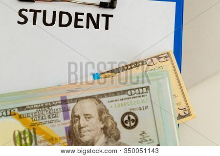 Fafsa. Student Aid Concept. Application Form Of Document On The Table With Money.