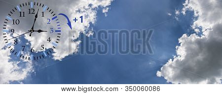 Daylight Saving Time (dst). Blue Sky With White Clouds And Clock. Turn Time Forward (+1H).