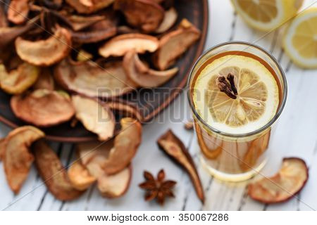 Dried Fruits Drink With Lemon On A Wooden Background. Uzvar Could Be Drunk Cold Or Hot.
