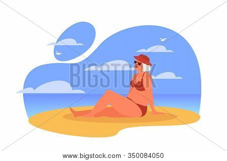 Happy And Active Senior Spending Time On The Beach.