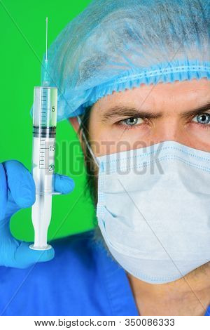 Closeup Photo Of Doctor With Syringe. Medicine. Concept Of Vaccination. Doctor With Syringe Preparin
