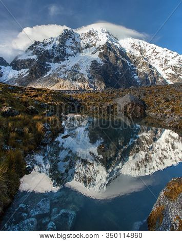 Evening View Of Mount Salkantay Mirroring In Lake, Salkantay Trek In The Way To Machu Picchu, Cuzco 