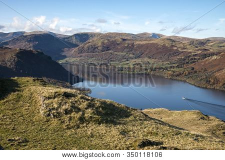 Epic Autumn Fall Landscape Of Ullswater And Surrounding Mountains And Hills Viewed From Hallin Fell 