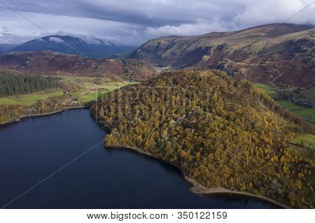 Beautiful Aerial Drone Landscape Image Of Glorious Autumn Fall Sun Over Thirlmere In Lake District