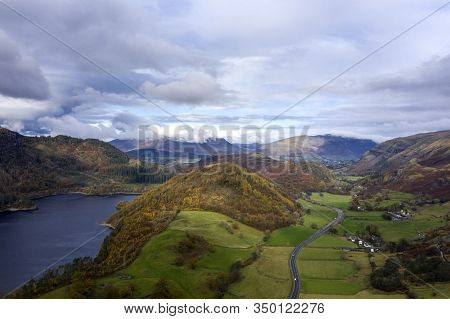 Beautiful Aerial Drone Landscape Image Of Glorious Autumn Fall Sun Over Thirlmere In Lake District