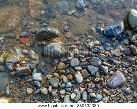 Rock Stone On The Beach In The Clean Water