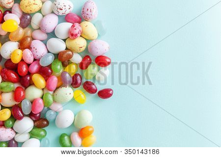 Happy Easter Concept. Preparation For Holiday. Easter Candy Chocolate Eggs And Jellybean Sweets Isol