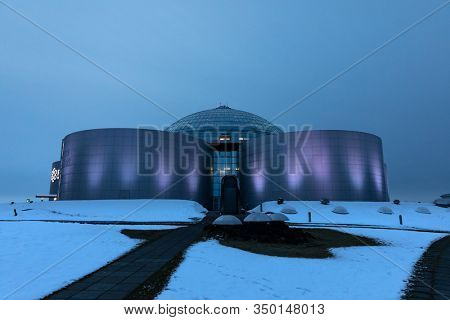 Reykjavik, Iceland - 18 January 2020: The Perlan Museum and Planitarium, Reykjavik. This modern building consists of tanks filled with geothermal water in a city that aims to be carbon neutral by 2040