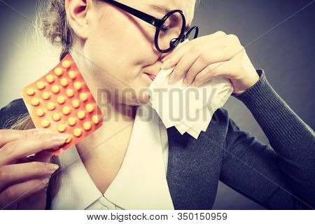 Sickness And Diseases At Work. Young Unhealthy Businesswoman With Tissue Having Flu Grippe. Secretar
