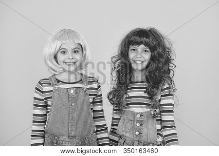 Happy Little Girls Smiling Faces. Anime Fan. Cheerful Friends In Bright Colorful Wigs. Anime Cosplay