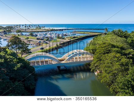 Aerial Shot Of The River Anahulu And The Twin Arched Road Bridge In The North Shore Town Of Haleiwa