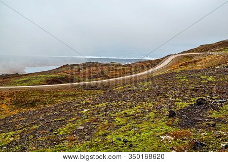Mountains And Ocean View In Borgarfjordur Eystri In East Iceland In A Foggy Day