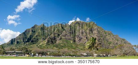 Kualoa, Hi - 24 January 2020: Panorama Of The Mountains Behind Kualoa Ranch, A Tourist Attraction On