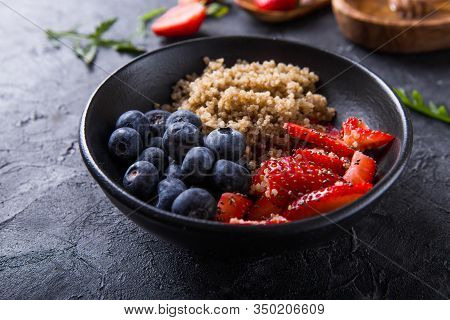 Healthy Vegan Diet Salad Quinoa With Blueberry,strawberry, Honey And Chia Seeds. Concept Sooper Food