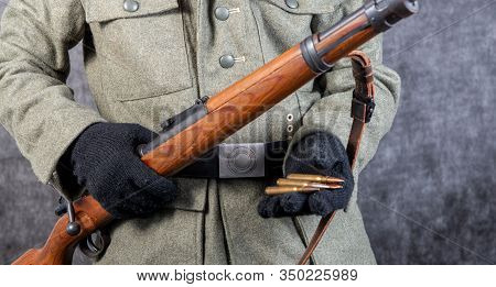 A Close Up Of World War Two German Soldier With Rifle