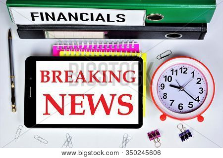 Breaking News-a Text Message On The Screen Of The Tablet Computer Monitor. Information-interesting F