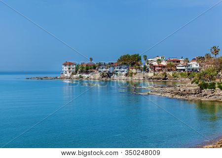 Beautiful View Of The Catholic Baroque Church On The Background Of Blue Sky. Amazing Cityscape With 