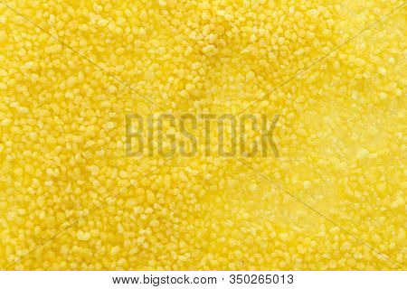 Porridge Kuskus Couscous With Bulgur. Background Texture. Top View Selective Focus