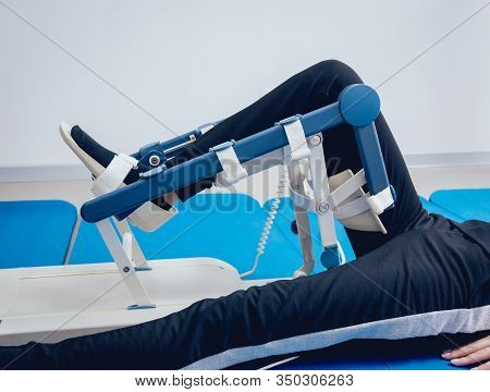 Patient On Cpm Machines. Continuous Passive Range Of Motion.