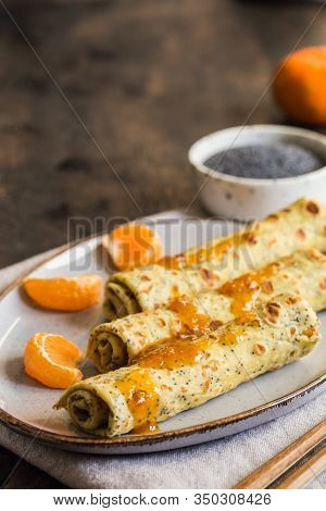Poppy Seed Crepes (blinis). Pancakes With Poppy Seeds And Tangerine Jam