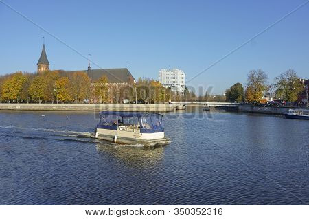 Tourist Boat About On The River, Cathedral On Knaiphof Island, Kaliningrad Russia, October 24, 2019